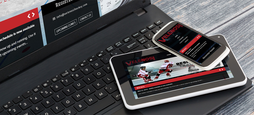 The Velenosi website as seen on multiple devices, a phone, tablet and laptop